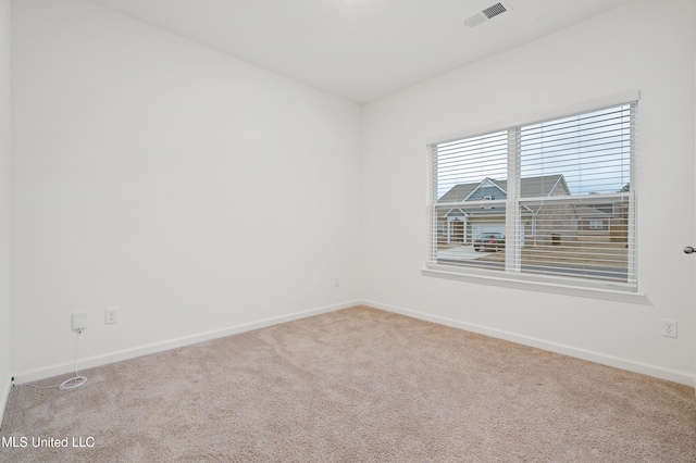 empty room featuring carpet