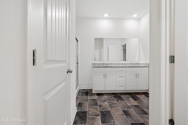 bathroom featuring vanity