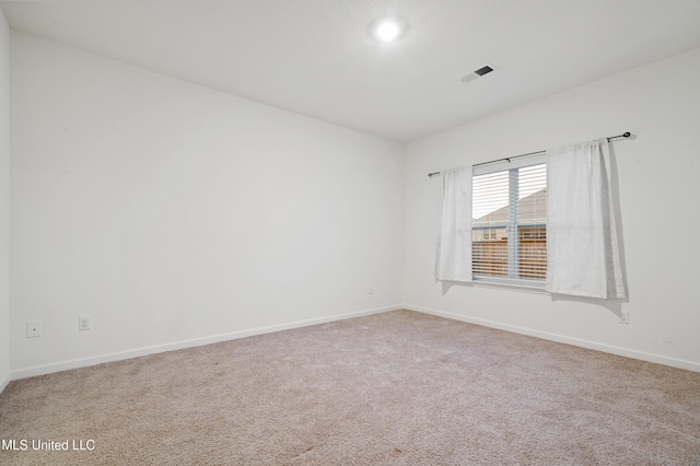 view of carpeted spare room