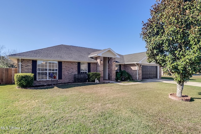 ranch-style house featuring a garage and a front lawn