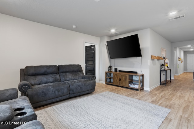 living room with wood-type flooring