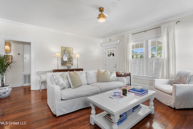 living room with crown molding, dark wood-type flooring, and ceiling fan