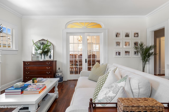 sitting room with french doors, dark wood-type flooring, and ornamental molding