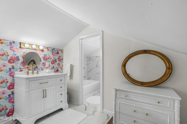 bathroom with baseboards, ornamental molding, marble finish floor, and vanity