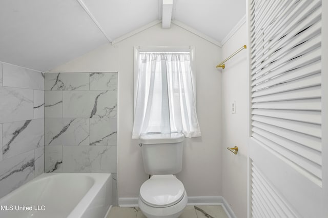 bathroom featuring vaulted ceiling with beams, a tub, and toilet