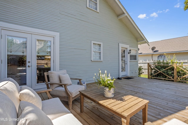 wooden deck with outdoor lounge area