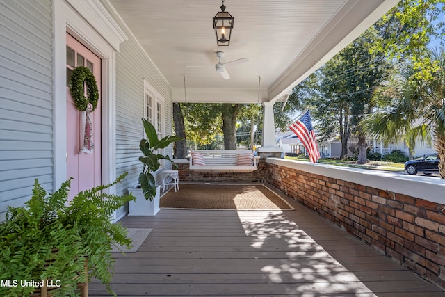 wooden terrace with a porch