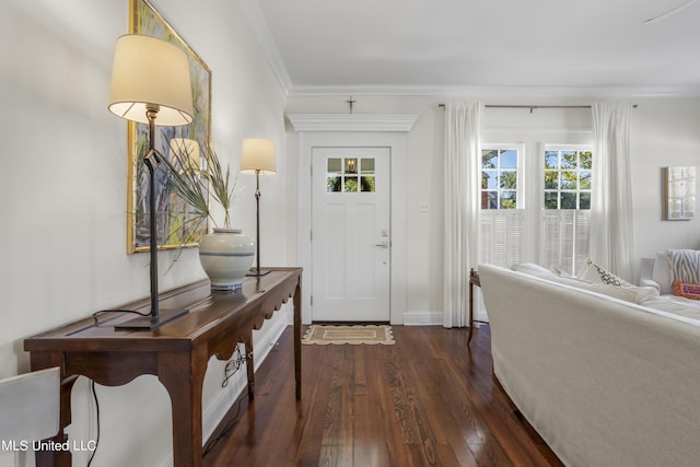 entryway with baseboards, ornamental molding, and dark wood-style flooring