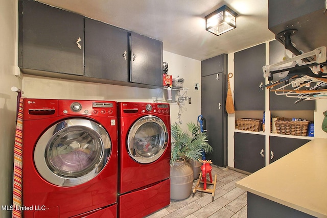 719 Holly Hills Dr, Biloxi, MS 39532 - washroom featuring cabinet space and washing machine and dryer