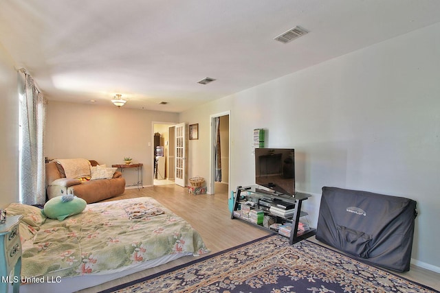 719 Holly Hills Dr, Biloxi, MS 39532 - bedroom with wood finished floors and baseboards