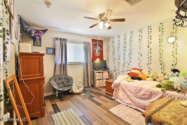 719 Holly Hills Dr, Biloxi, MS 39532 - bedroom featuring wood finished floors and a ceiling fan