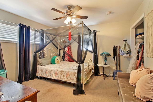 719 Holly Hills Dr, Biloxi, MS 39532 - carpeted bedroom with a ceiling fan