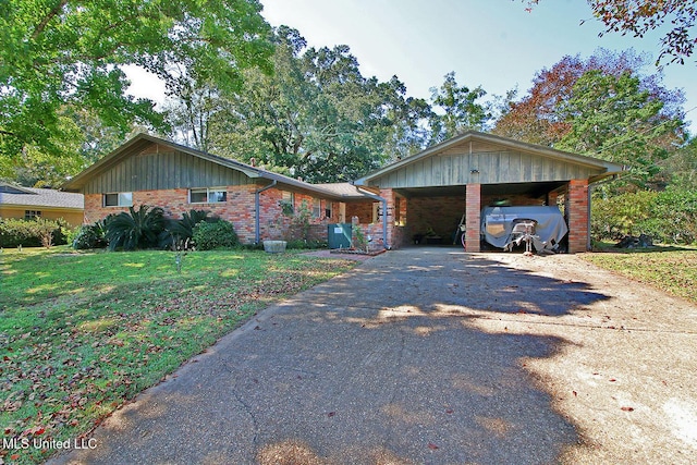 719 Holly Hills Dr, Biloxi, MS 39532 - view of front of property featuring driveway, a front yard, and brick siding