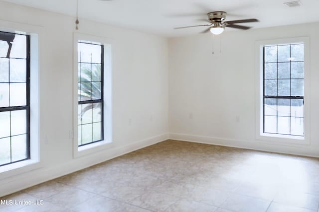 spare room featuring ceiling fan