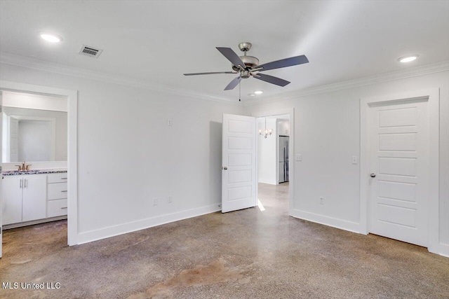 unfurnished bedroom featuring ceiling fan, crown molding, and ensuite bath