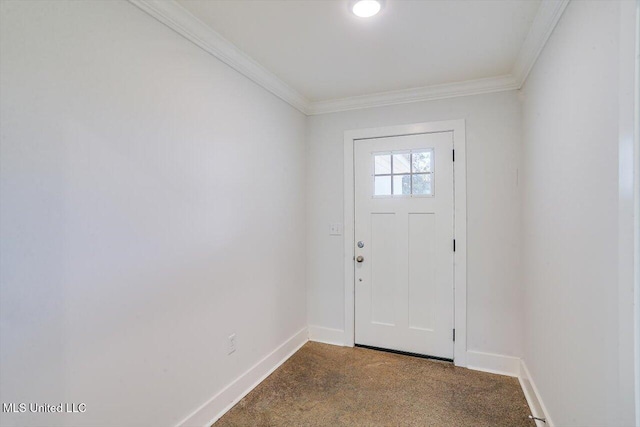 entryway with dark colored carpet and crown molding