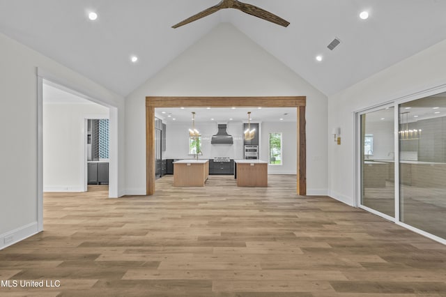 104 Westlake Cir W, Madison, MS 39110 - unfurnished living room with light wood-style floors, ceiling fan, recessed lighting, and high vaulted ceiling