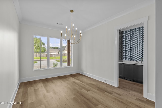 104 Westlake Cir W, Madison, MS 39110 - unfurnished dining area featuring a chandelier, light wood finished floors, and ornamental molding
