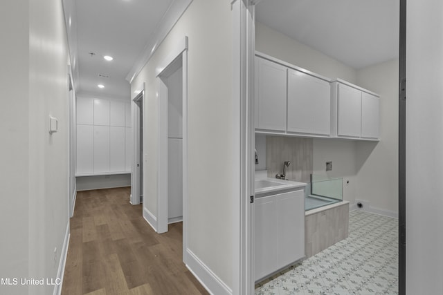 104 Westlake Cir W, Madison, MS 39110 - washroom featuring cabinet space, light flooring, electric dryer hookup, and recessed lighting