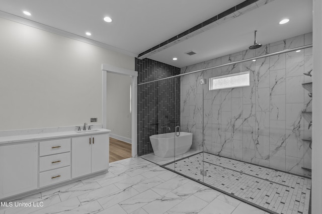 104 Westlake Cir W, Madison, MS 39110 - full bathroom with a marble finish shower, marble finish flooring, recessed lighting, a freestanding tub, and vanity