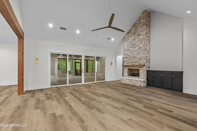 104 Westlake Cir W, Madison, MS 39110 - unfurnished living room with high vaulted ceiling, a ceiling fan, a fireplace, light wood-type flooring, and recessed lighting