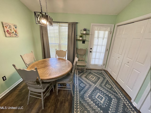 5306 Kristy Ln, Southaven, MS 38671 - dining room with plenty of natural light, dark wood-style floors, and a chandelier