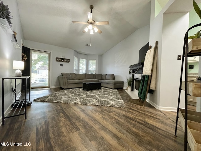 5306 Kristy Ln, Southaven, MS 38671 - living room with lofted ceiling, wood finished floors, and a ceiling fan