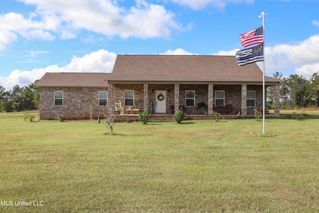 view of front of home with a front lawn