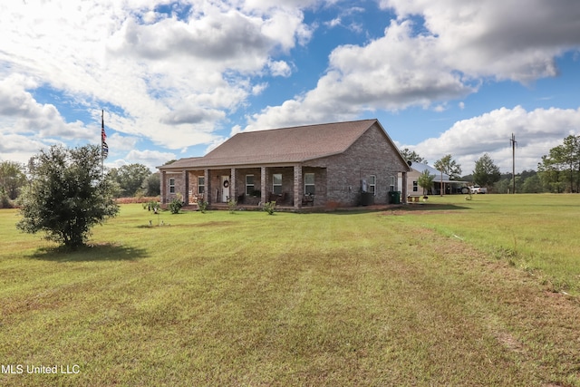 exterior space with a yard