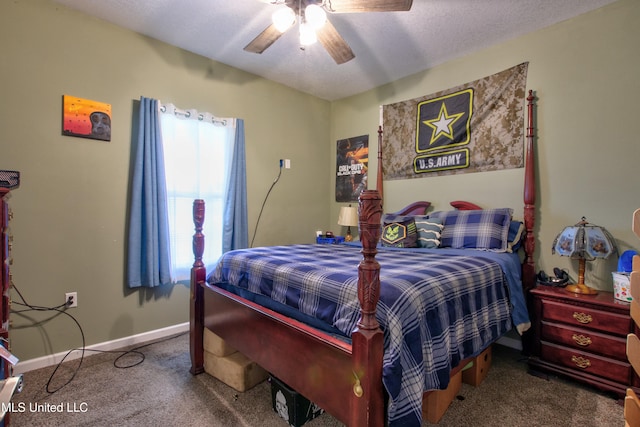 carpeted bedroom with a textured ceiling and ceiling fan