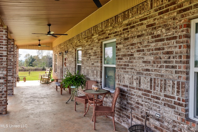 view of patio / terrace featuring ceiling fan