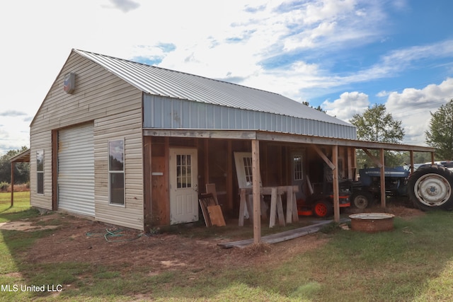 view of outbuilding with a garage