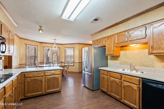 kitchen featuring ornamental molding, dark wood-type flooring, stainless steel fridge, dishwasher, and a peninsula