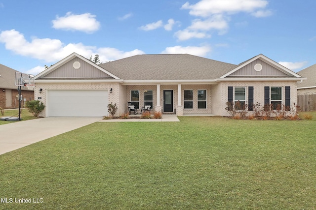 view of front of house featuring a garage and a front yard