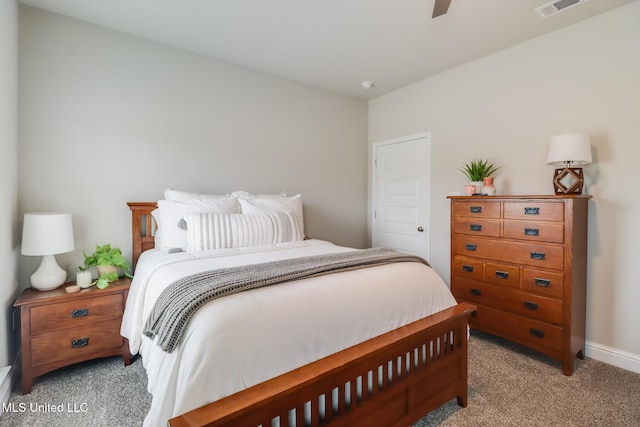 carpeted bedroom with ceiling fan