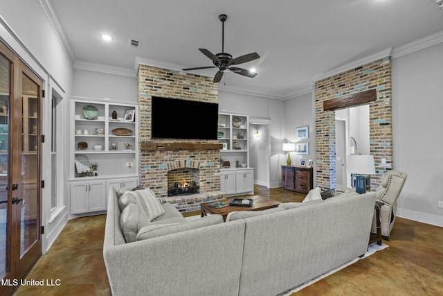 living room with ceiling fan, ornamental molding, a fireplace, and built in features