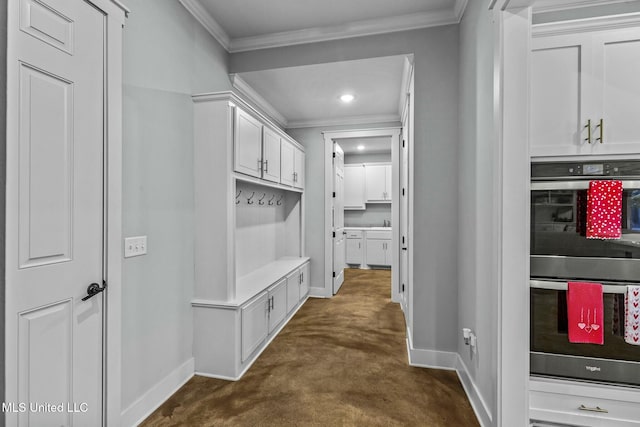 mudroom featuring ornamental molding