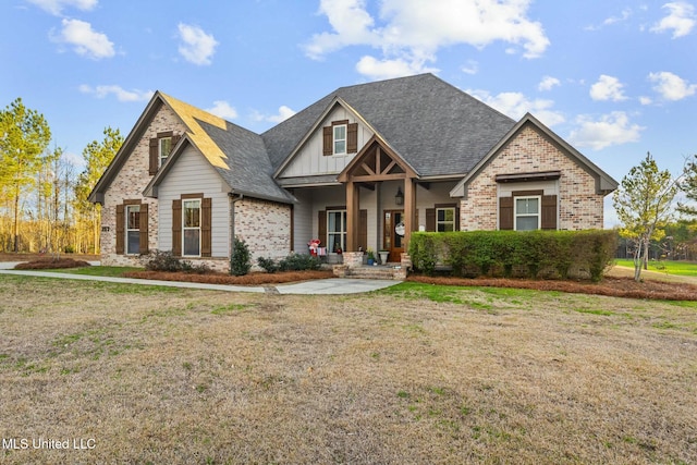 craftsman-style home featuring a front lawn