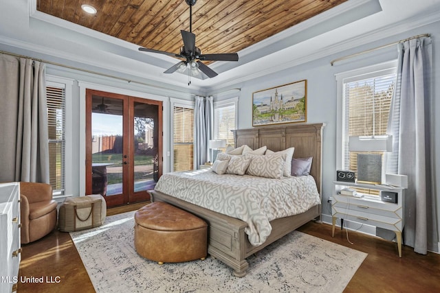 bedroom with multiple windows, access to outside, wooden ceiling, and a raised ceiling