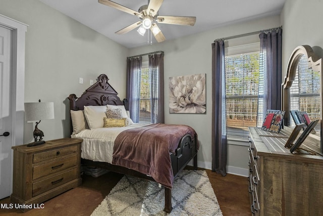 bedroom featuring lofted ceiling and ceiling fan