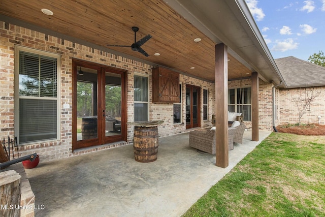 view of patio / terrace featuring an outdoor hangout area, ceiling fan, and french doors