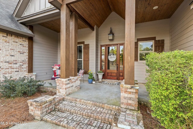 doorway to property featuring a porch