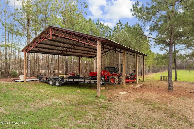 view of parking / parking lot with a carport and a lawn