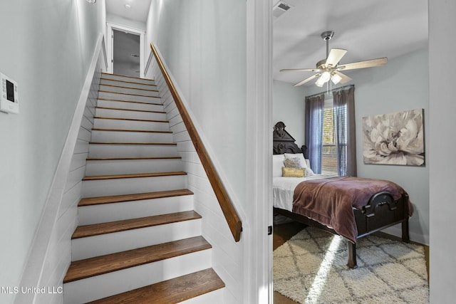 stairs with ceiling fan