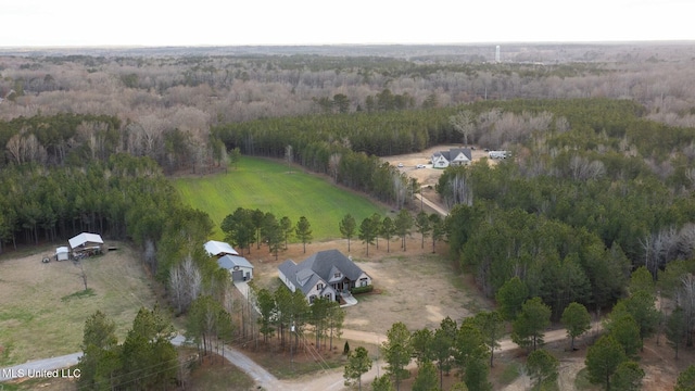 birds eye view of property with a rural view