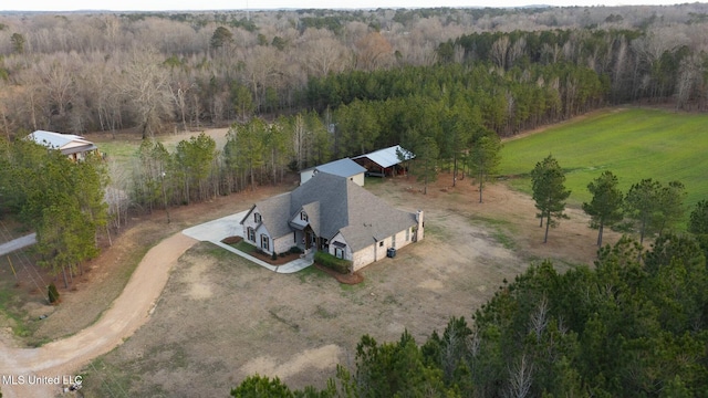 birds eye view of property featuring a rural view