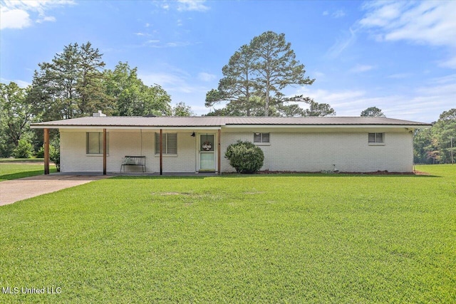 12661 Springridge Rd, Terry, MS 39170 - ranch-style home with brick siding, a front lawn, and covered porch