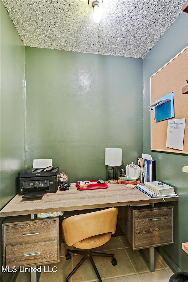 12661 Springridge Rd, Terry, MS 39170 - office with tile patterned flooring and a textured ceiling