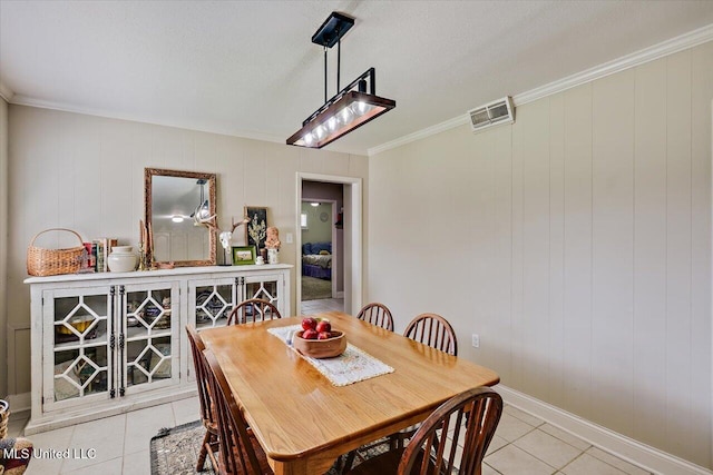 12661 Springridge Rd, Terry, MS 39170 - dining area featuring light tile patterned floors, baseboards, and ornamental molding