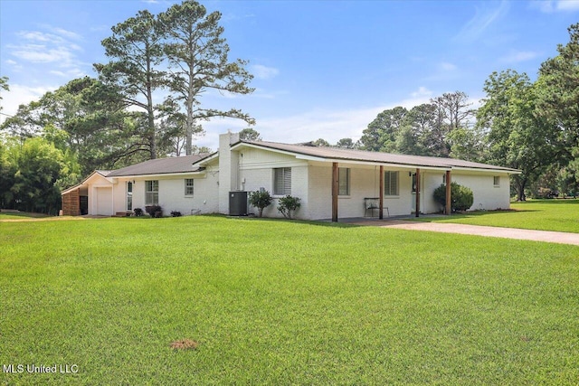 12661 Springridge Rd, Terry, MS 39170 - view of front of house featuring a front lawn, covered porch, metal roof, and central AC